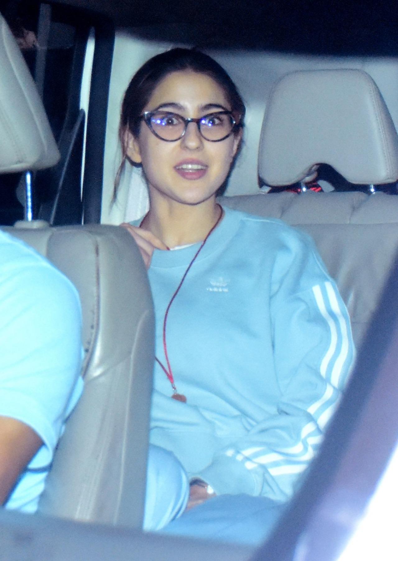 Sara Ali Khan was spotted in her car outside Kalina airport, donning a blue tracksuit with white stripes. The actress seemed to be both astonished and flattered by the paparazzi